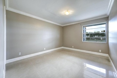 Discover this fully renovated, second-floor corner condo in on Kings Point Golf -Flanders Way in Florida - for sale on GolfHomes.com, golf home, golf lot