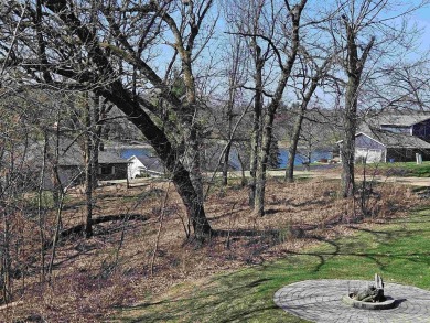 Welcome to this beautiful ranch home set on a generous .78 acre on Lake Carroll Golf Course in Illinois - for sale on GolfHomes.com, golf home, golf lot