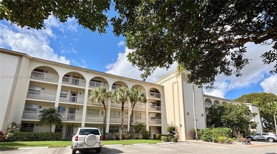 Welcome to resort-style living in this beautifully maintained on Wynmoor Golf Course in Florida - for sale on GolfHomes.com, golf home, golf lot