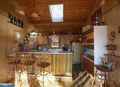 Mid Century Modern Lake Cottage! Private Golf Course Out Front on Eshquaguma Country Club in Minnesota - for sale on GolfHomes.com, golf home, golf lot