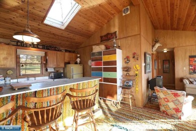 Mid Century Modern Lake Cottage! Private Golf Course Out Front on Eshquaguma Country Club in Minnesota - for sale on GolfHomes.com, golf home, golf lot