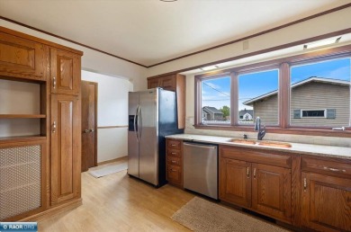 This beautifully maintained 4-bedroom, 3-bathroom home is on Virginia Golf Course in Minnesota - for sale on GolfHomes.com, golf home, golf lot