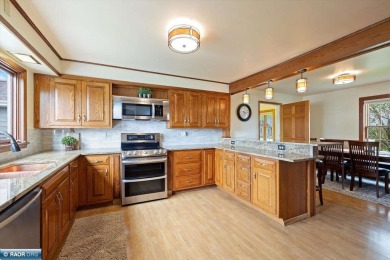 This beautifully maintained 4-bedroom, 3-bathroom home is on Virginia Golf Course in Minnesota - for sale on GolfHomes.com, golf home, golf lot