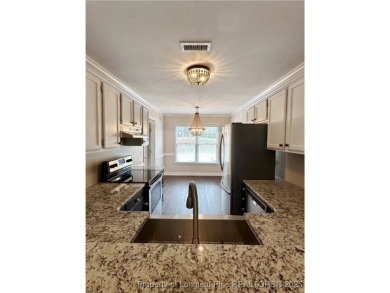 Absolute darling townhome tucked along #12 green @King's Grant on Kings Grant Golf and Country Club in North Carolina - for sale on GolfHomes.com, golf home, golf lot