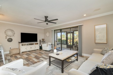 Beautiful lakefront condo just steps from the entrance to on Suntree Country Club in Florida - for sale on GolfHomes.com, golf home, golf lot