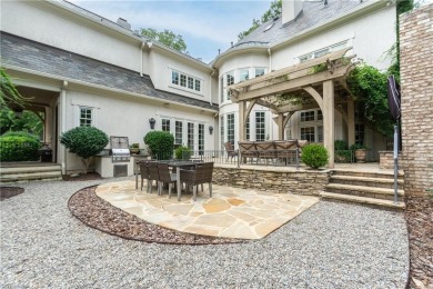 Stately Wolfe-built custom English Country home in the heart of on Greensboro Country Club in North Carolina - for sale on GolfHomes.com, golf home, golf lot