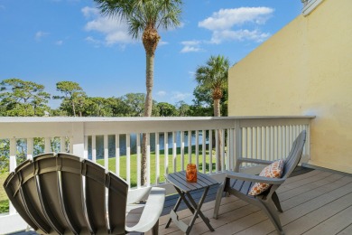 Beautiful lakefront condo just steps from the entrance to on Suntree Country Club in Florida - for sale on GolfHomes.com, golf home, golf lot