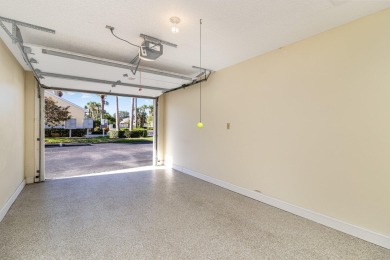 Beautiful lakefront condo just steps from the entrance to on Suntree Country Club in Florida - for sale on GolfHomes.com, golf home, golf lot