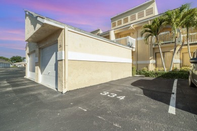 Beautiful lakefront condo just steps from the entrance to on Suntree Country Club in Florida - for sale on GolfHomes.com, golf home, golf lot