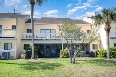 Beautiful lakefront condo just steps from the entrance to on Suntree Country Club in Florida - for sale on GolfHomes.com, golf home, golf lot