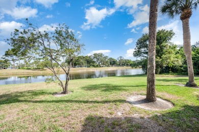 Beautiful lakefront condo just steps from the entrance to on Suntree Country Club in Florida - for sale on GolfHomes.com, golf home, golf lot