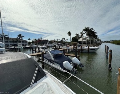 This is a rare opportunity to own a deeded boat slip in the ONLY on Windstar on Naples Bay in Florida - for sale on GolfHomes.com, golf home, golf lot