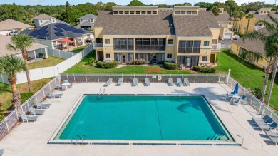 Beautiful lakefront condo just steps from the entrance to on Suntree Country Club in Florida - for sale on GolfHomes.com, golf home, golf lot