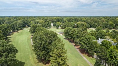 Stately Wolfe-built custom English Country home in the heart of on Greensboro Country Club in North Carolina - for sale on GolfHomes.com, golf home, golf lot