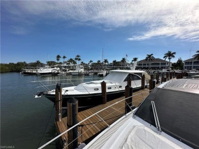 This is a rare opportunity to own a deeded boat slip in the ONLY on Windstar on Naples Bay in Florida - for sale on GolfHomes.com, golf home, golf lot