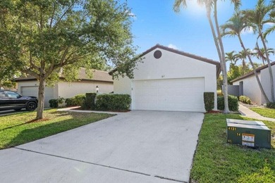 Discover the perfect blend of comfort and convenience within the on PGA National Golf Club in Florida - for sale on GolfHomes.com, golf home, golf lot