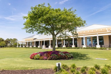 Beautiful lakefront condo just steps from the entrance to on Suntree Country Club in Florida - for sale on GolfHomes.com, golf home, golf lot