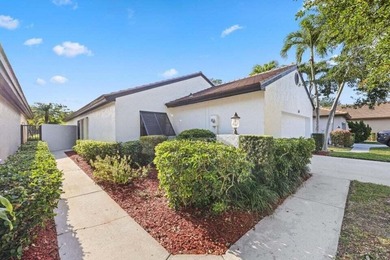 Discover the perfect blend of comfort and convenience within the on PGA National Golf Club in Florida - for sale on GolfHomes.com, golf home, golf lot