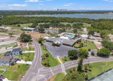 Located across from Hole 8 of the St. Petersburg Country Club on St. Petersburg Country Club in Florida - for sale on GolfHomes.com, golf home, golf lot