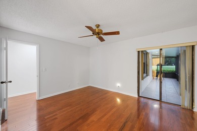 Discover the perfect blend of comfort and convenience within the on PGA National Golf Club in Florida - for sale on GolfHomes.com, golf home, golf lot