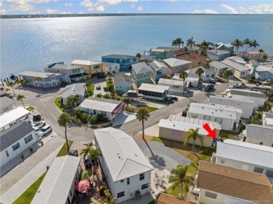 MUST SEE BEACH HOME --- CUSTOM WOOD FRAMED with HIGH VAULTED on Island Dunes Country Club in Florida - for sale on GolfHomes.com, golf home, golf lot