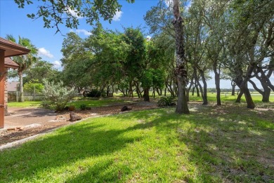 Nestled on a quiet, private cul-de-sac in the Rockport Country on Rockport Country Club in Texas - for sale on GolfHomes.com, golf home, golf lot