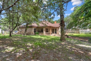 Nestled on a quiet, private cul-de-sac in the Rockport Country on Rockport Country Club in Texas - for sale on GolfHomes.com, golf home, golf lot