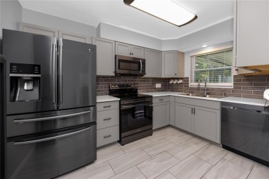 Check out this GEM of a home today!  This beautifully updated on Clearwater Country Club in Florida - for sale on GolfHomes.com, golf home, golf lot