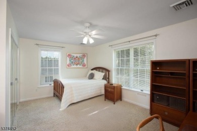 Welcome to this sun-filled 4-bedroom Colonial backing to the on Warrenbrook Golf Course in New Jersey - for sale on GolfHomes.com, golf home, golf lot