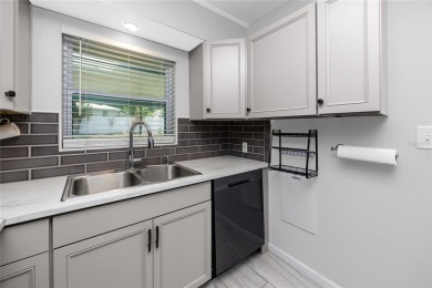 Check out this GEM of a home today!  This beautifully updated on Clearwater Country Club in Florida - for sale on GolfHomes.com, golf home, golf lot