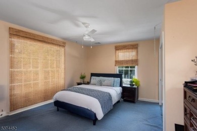 Welcome to this sun-filled 4-bedroom Colonial backing to the on Warrenbrook Golf Course in New Jersey - for sale on GolfHomes.com, golf home, golf lot