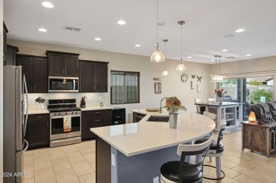 Better than new! This home has a great floorplan and soothing on Poston Butte Golf Club in Arizona - for sale on GolfHomes.com, golf home, golf lot