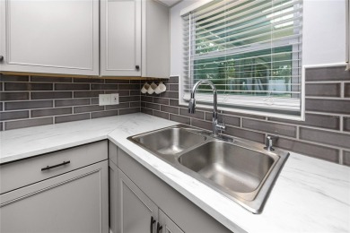 Check out this GEM of a home today!  This beautifully updated on Clearwater Country Club in Florida - for sale on GolfHomes.com, golf home, golf lot