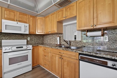 ASSOC REQUIRES 20% DOWN & 1 OCCUP on Wynmoor Golf Course in Florida - for sale on GolfHomes.com, golf home, golf lot