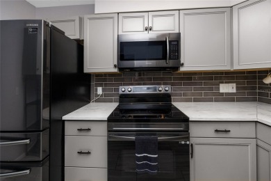Check out this GEM of a home today!  This beautifully updated on Clearwater Country Club in Florida - for sale on GolfHomes.com, golf home, golf lot