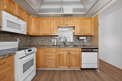 ASSOC REQUIRES 20% DOWN & 1 OCCUP 55+ VACANT/CLICK ON SHOWING on Wynmoor Golf Course in Florida - for sale on GolfHomes.com, golf home, golf lot