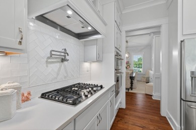 Experience refined living in this stunning 2022 custom-built on Bay Creek Golf Club in Virginia - for sale on GolfHomes.com, golf home, golf lot