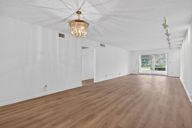 ASSOC REQUIRES 20% DOWN & 1 OCCUP on Wynmoor Golf Course in Florida - for sale on GolfHomes.com, golf home, golf lot