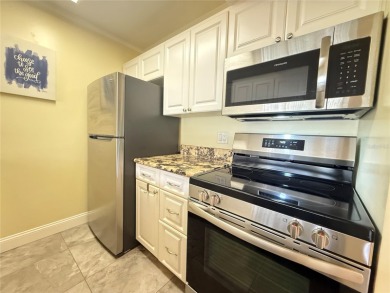 Not just another condo. This tastefully modern, affordable, low on Largo Golf Course in Florida - for sale on GolfHomes.com, golf home, golf lot