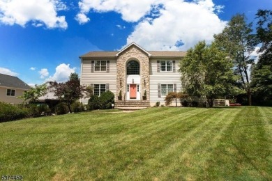 Welcome to this sun-filled 4-bedroom Colonial backing to the on Warrenbrook Golf Course in New Jersey - for sale on GolfHomes.com, golf home, golf lot