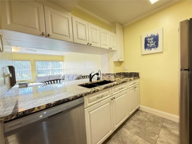 Not just another condo. This tastefully modern, affordable, low on Largo Golf Course in Florida - for sale on GolfHomes.com, golf home, golf lot