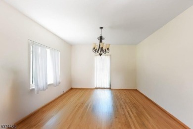 Welcome to this sun-filled 4-bedroom Colonial backing to the on Warrenbrook Golf Course in New Jersey - for sale on GolfHomes.com, golf home, golf lot