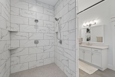 Experience refined living in this stunning 2022 custom-built on Bay Creek Golf Club in Virginia - for sale on GolfHomes.com, golf home, golf lot