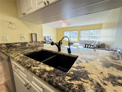 Not just another condo. This tastefully modern, affordable, low on Largo Golf Course in Florida - for sale on GolfHomes.com, golf home, golf lot
