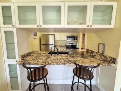 Not just another condo. This tastefully modern, affordable, low on Largo Golf Course in Florida - for sale on GolfHomes.com, golf home, golf lot