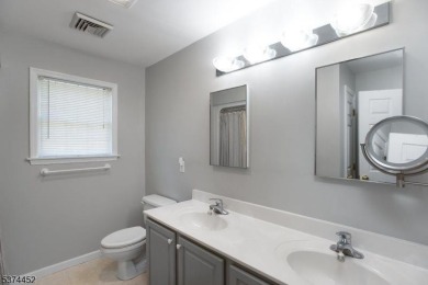 Welcome to this sun-filled 4-bedroom Colonial backing to the on Warrenbrook Golf Course in New Jersey - for sale on GolfHomes.com, golf home, golf lot