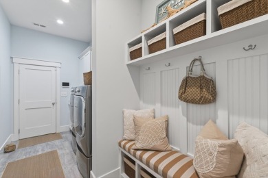 Experience refined living in this stunning 2022 custom-built on Bay Creek Golf Club in Virginia - for sale on GolfHomes.com, golf home, golf lot