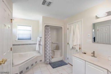 Welcome to this sun-filled 4-bedroom Colonial backing to the on Warrenbrook Golf Course in New Jersey - for sale on GolfHomes.com, golf home, golf lot
