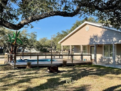 Coastal home on 0.5 acres near Goose Island State Park  Rockport on Lamar Golf Course in Texas - for sale on GolfHomes.com, golf home, golf lot