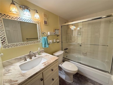 Not just another condo. This tastefully modern, affordable, low on Largo Golf Course in Florida - for sale on GolfHomes.com, golf home, golf lot